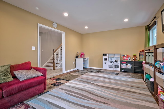 recreation room featuring carpet floors, baseboards, and recessed lighting