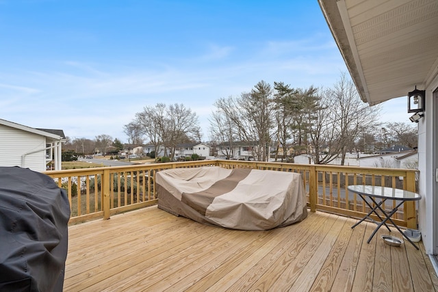 deck featuring a residential view and area for grilling