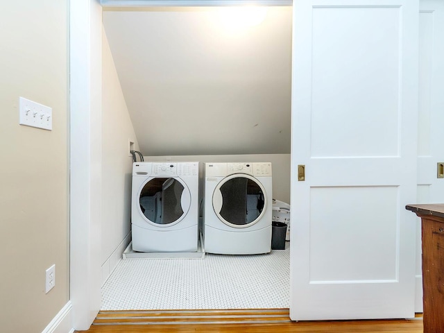 laundry room featuring washer and clothes dryer