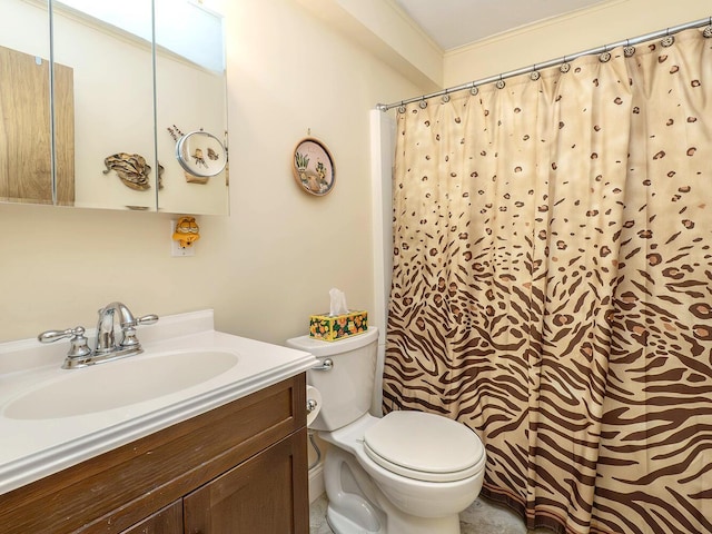 bathroom featuring ornamental molding, vanity, toilet, and a shower with curtain