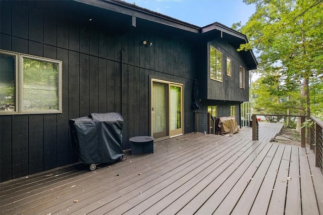 wooden deck with grilling area