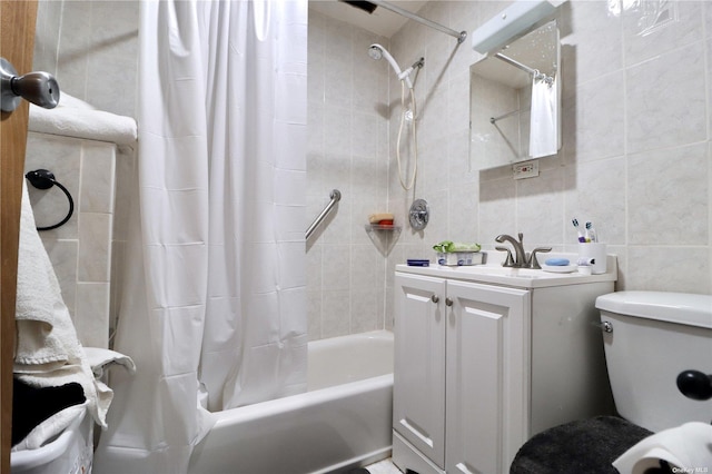 full bath featuring shower / bath combination with curtain, toilet, tile walls, and vanity