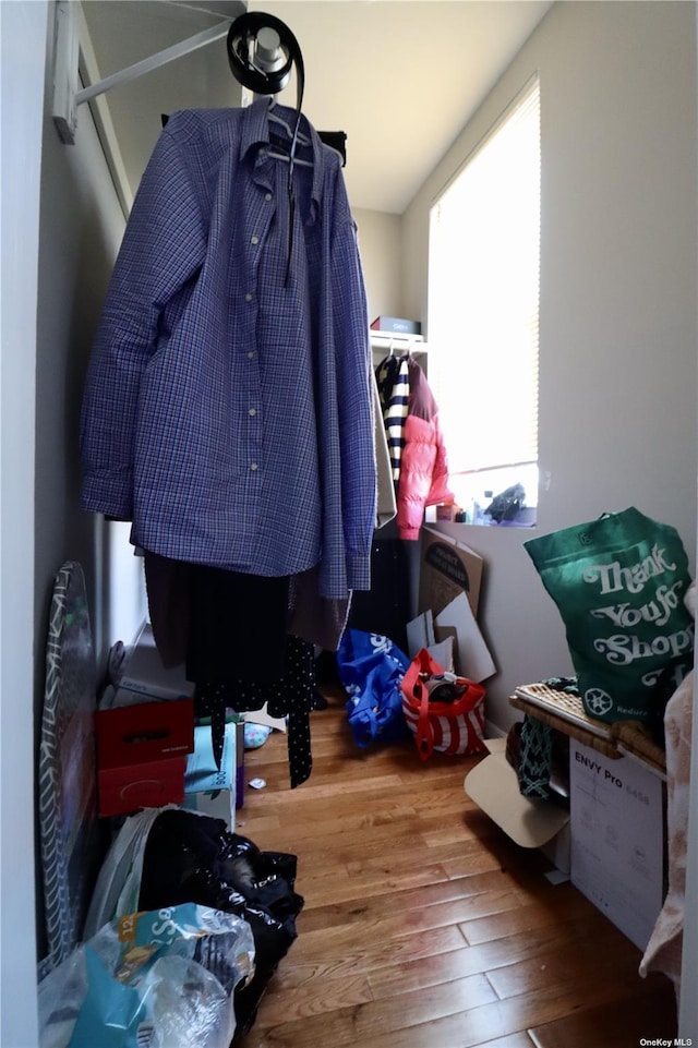 spacious closet with wood finished floors