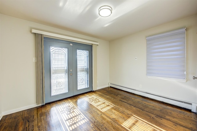 empty room featuring french doors, baseboards, baseboard heating, and hardwood / wood-style flooring