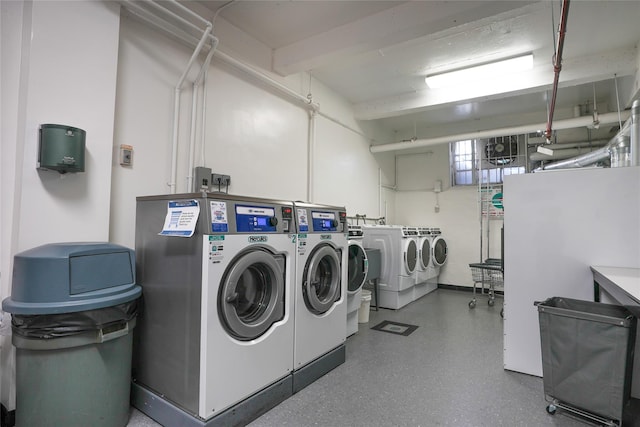 shared laundry area featuring independent washer and dryer