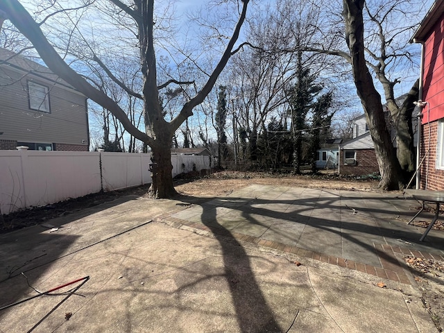 view of yard featuring a patio area and fence