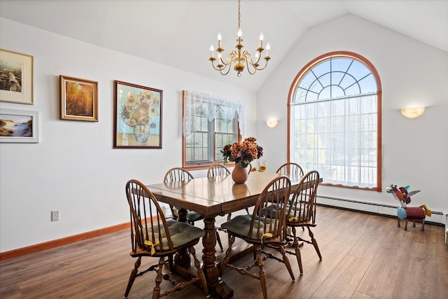 dining space featuring a baseboard heating unit, vaulted ceiling, wood finished floors, and a chandelier