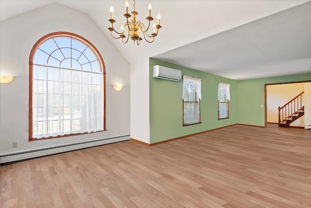 157 Pier Ave, Jamesport, NY 11901 - empty room with a wall unit AC, a chandelier, baseboard heating, light wood-type flooring, and vaulted ceiling