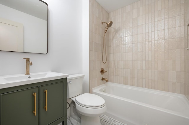 bathroom featuring bathtub / shower combination, vanity, and toilet