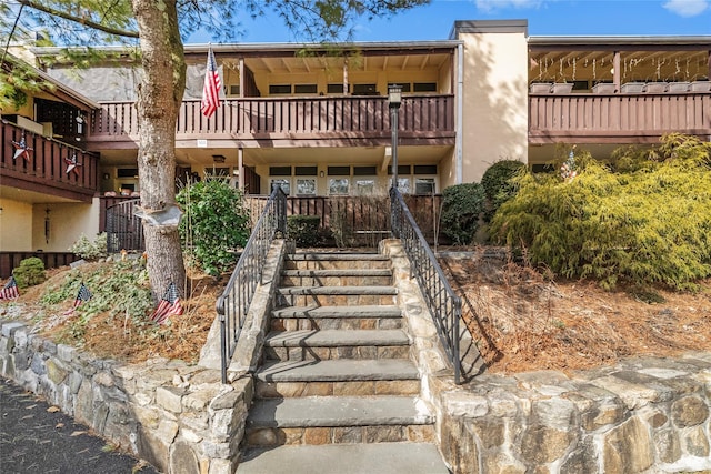 view of building exterior with stairway