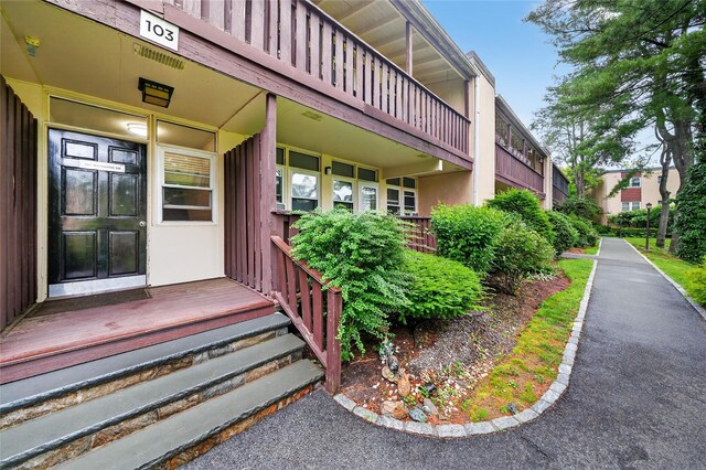 103 Wiltshire Rd Unit D13, Scarsdale, NY 10583 - property entrance with stucco siding