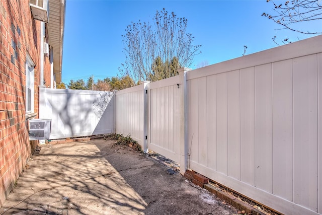 exterior space with a fenced backyard