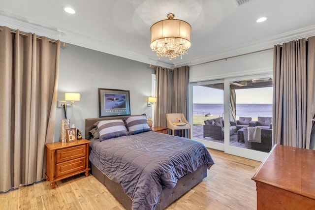 bedroom with light wood-style flooring, access to outside, crown molding, a notable chandelier, and recessed lighting