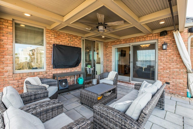 view of patio with ceiling fan and outdoor lounge area