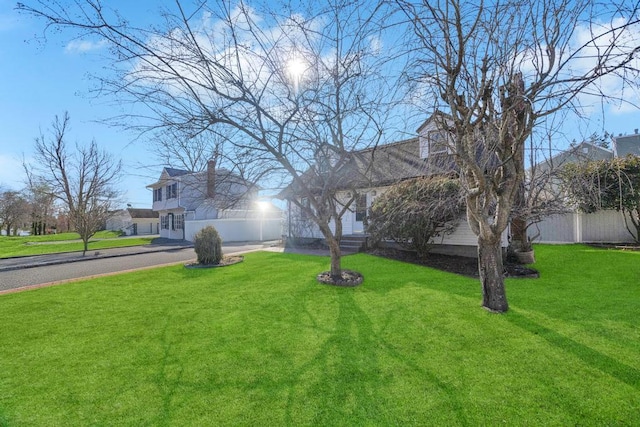 view of yard with fence