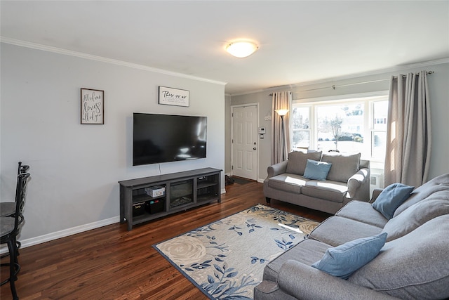 living area featuring dark wood-style floors, crown molding, and baseboards