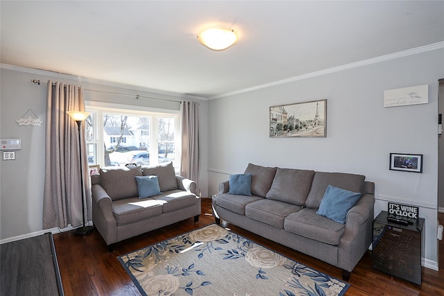 living area featuring ornamental molding and wood finished floors