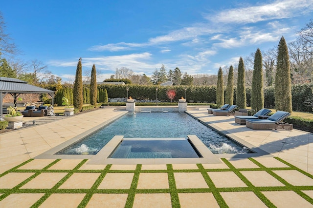 pool with outdoor lounge area, fence, and a patio