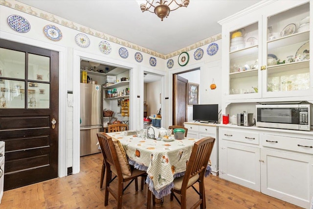 dining room featuring light wood-type flooring