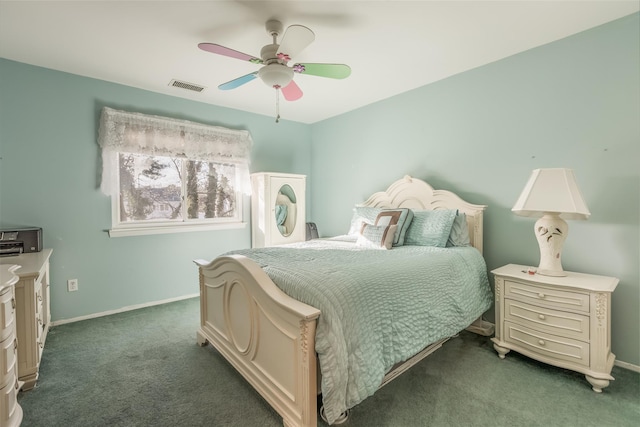 bedroom with a ceiling fan, baseboards, visible vents, and carpet flooring