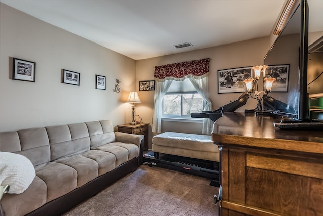 living room featuring visible vents and dark colored carpet