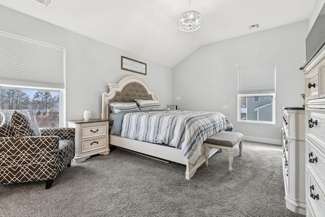 bedroom with lofted ceiling, carpet flooring, visible vents, and a notable chandelier