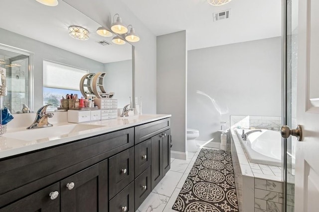 full bath with a bath, double vanity, visible vents, and a sink