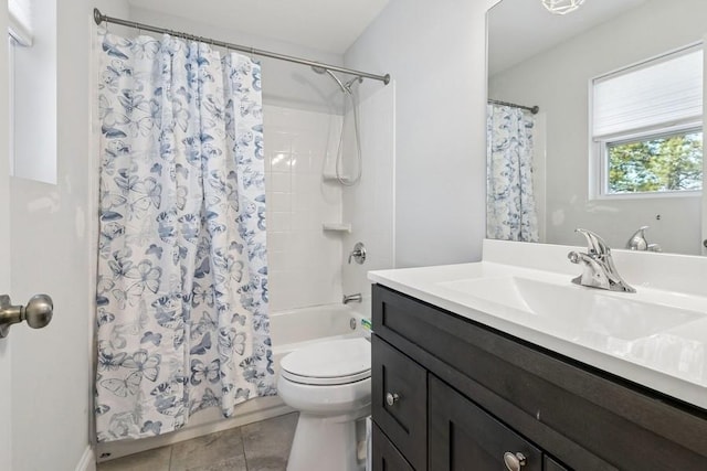 bathroom with shower / tub combo, vanity, toilet, and tile patterned floors