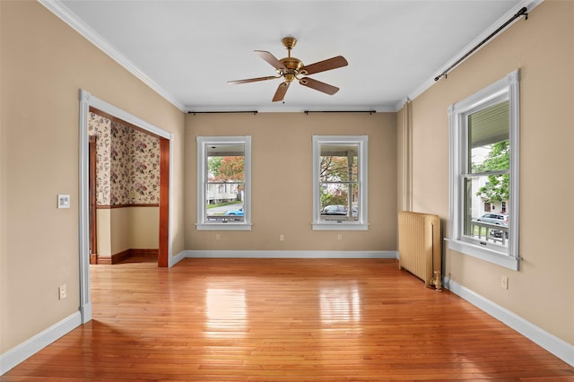 6 Agate Ave, Ossining, NY 10562 - unfurnished room featuring radiator, crown molding, light wood-style floors, a ceiling fan, and baseboards