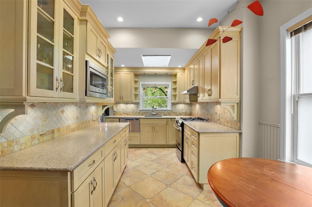 6 Agate Ave, Ossining, NY 10562 - kitchen featuring appliances with stainless steel finishes, a sink, under cabinet range hood, open shelves, and light brown cabinets