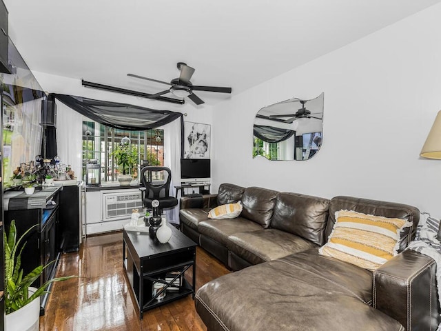 living area with dark wood-style flooring and a ceiling fan