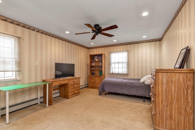 bedroom featuring ornamental molding, light carpet, baseboard heating, and multiple windows