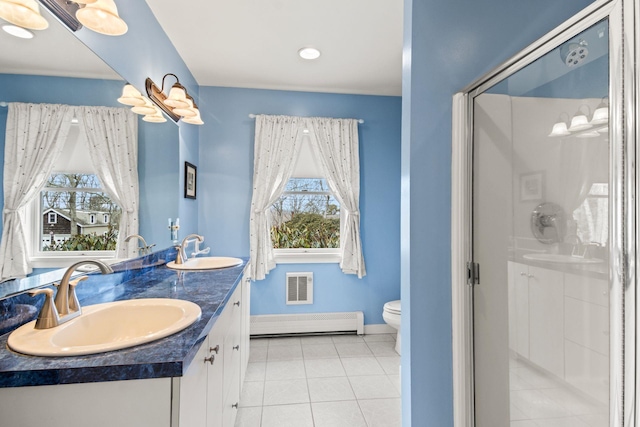 8 Rolling Woods Ln, Hampton Bays, NY 11946 - bathroom featuring a baseboard radiator, healthy amount of natural light, double vanity, and a shower stall