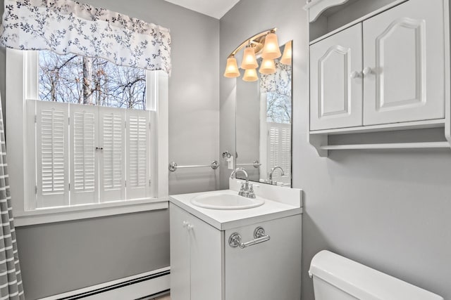 8 Rolling Woods Ln, Hampton Bays, NY 11946 - half bath with a baseboard heating unit and vanity