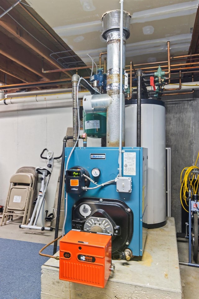 8 Rolling Woods Ln, Hampton Bays, NY 11946 - utility room featuring water heater