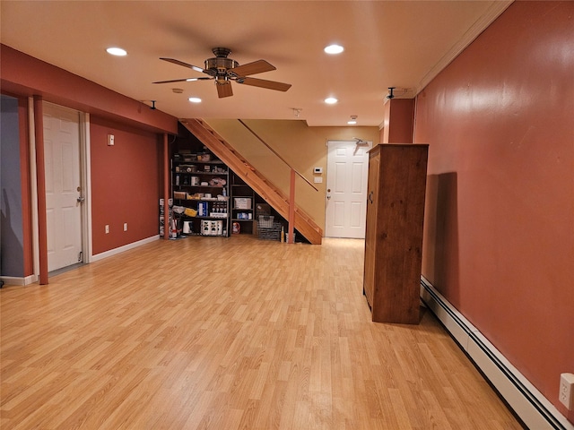 8 Rolling Woods Ln, Hampton Bays, NY 11946 - unfurnished living room with a baseboard heating unit, a ceiling fan, light wood finished floors, and recessed lighting