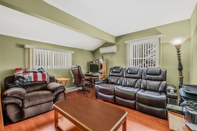 living room with an AC wall unit, vaulted ceiling with beams, and wood finished floors