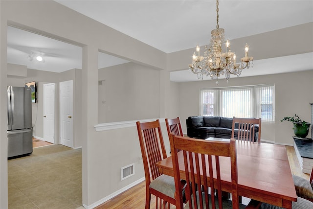 dining space with visible vents and baseboards