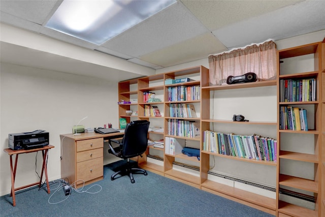 carpeted home office with a paneled ceiling and tile patterned floors