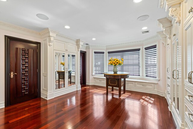 28 Whitney Cir, Glen Cove, NY 11542 - entrance foyer with recessed lighting, visible vents, dark wood-style flooring, and french doors