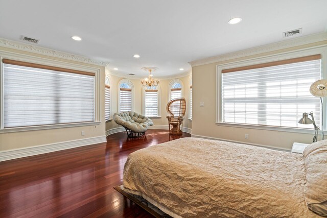 28 Whitney Cir, Glen Cove, NY 11542 - bedroom with dark wood-style floors, visible vents, baseboards, recessed lighting, and a notable chandelier