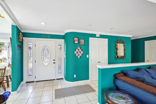 foyer entrance with light tile patterned floors, baseboards, crown molding, and recessed lighting