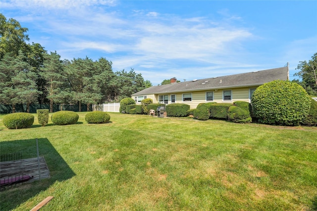 view of yard with fence