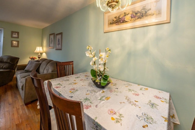 dining space featuring hardwood / wood-style floors