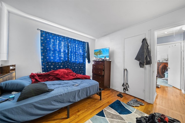 bedroom with wood-type flooring