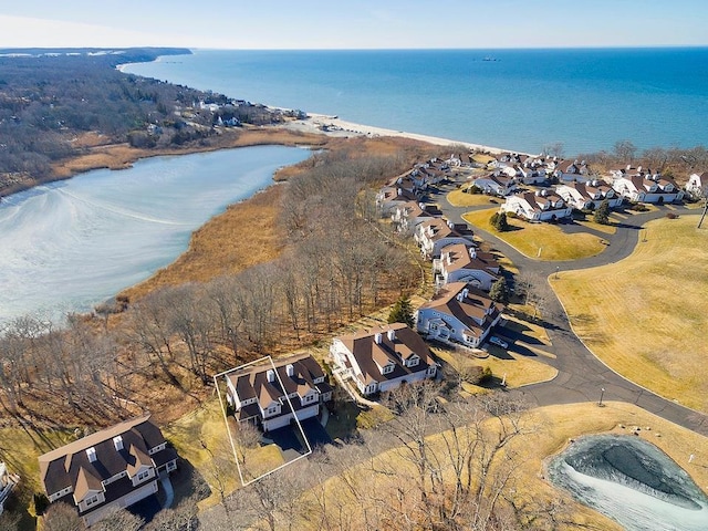 bird's eye view featuring a residential view and a water view