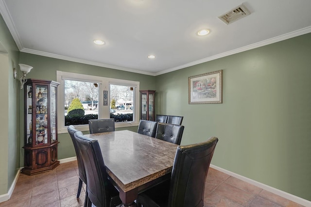 dining space with ornamental molding, recessed lighting, visible vents, and baseboards