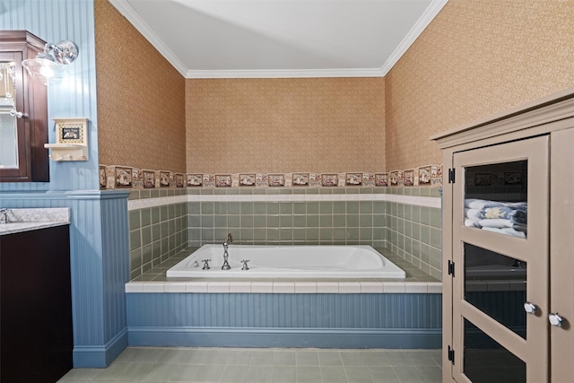 full bath with wallpapered walls, ornamental molding, a garden tub, and vanity