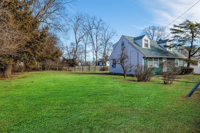 view of yard featuring fence