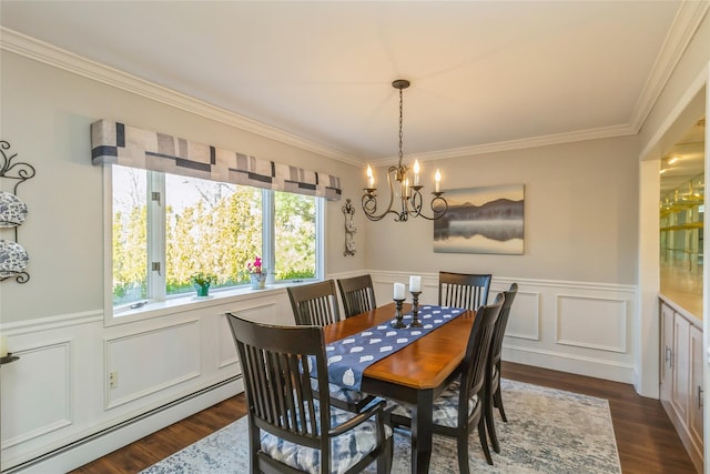 dining area featuring baseboard heating, dark wood finished floors, and crown molding